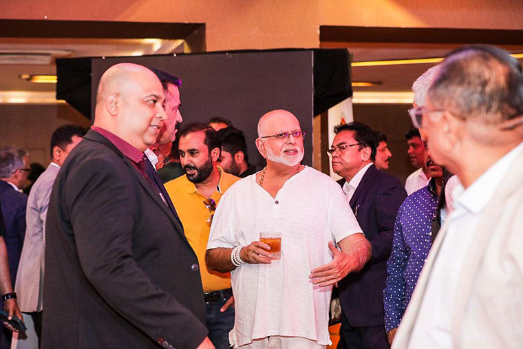 Sudhir C with other guests at the event