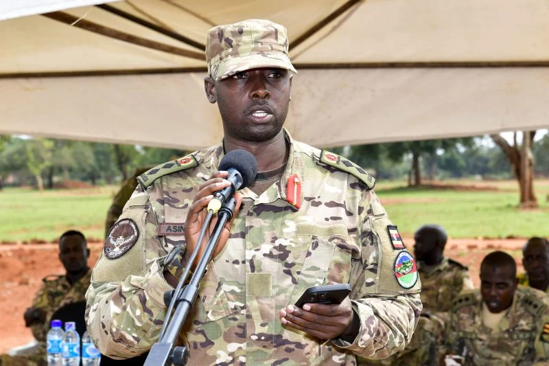 Col JB Asinguza the Director of Training in SFC addressing the soldiers during their passout at Kaweweta on Wednesday